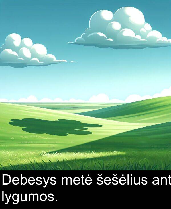 šešėlius: Debesys metė šešėlius ant lygumos.