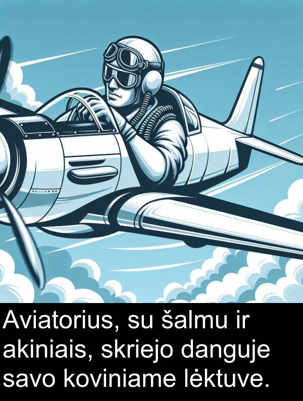 danguje: Aviatorius, su šalmu ir akiniais, skriejo danguje savo koviniame lėktuve.