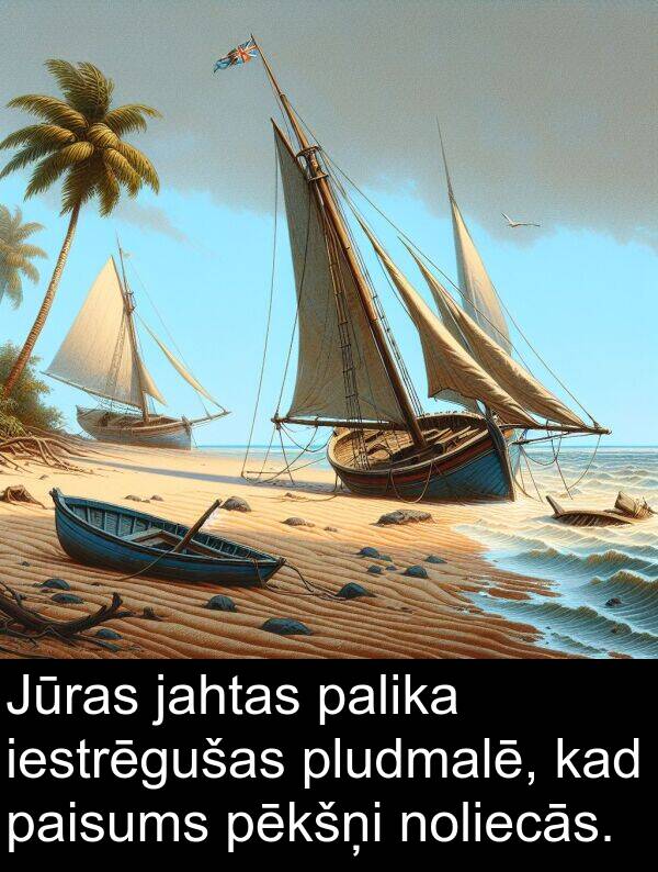 jahtas: Jūras jahtas palika iestrēgušas pludmalē, kad paisums pēkšņi noliecās.