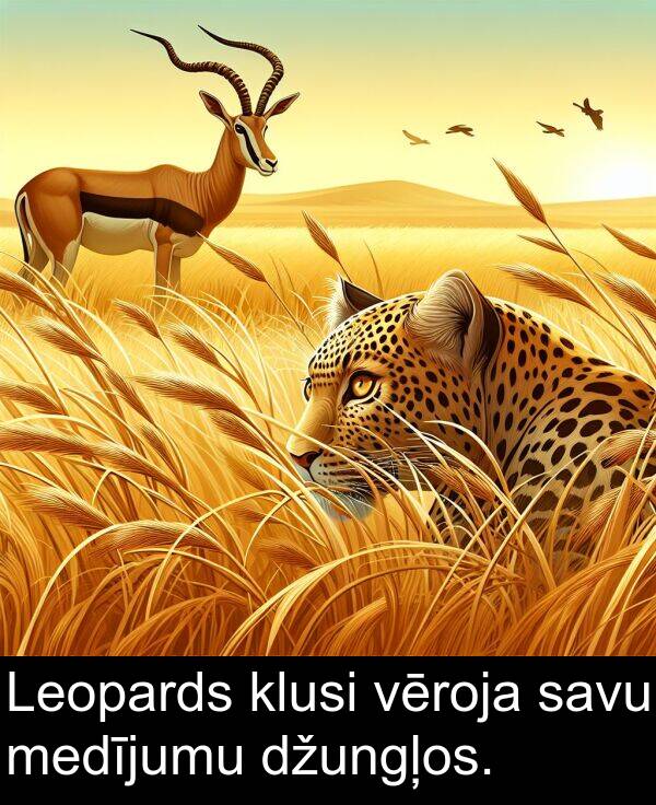 savu: Leopards klusi vēroja savu medījumu džungļos.