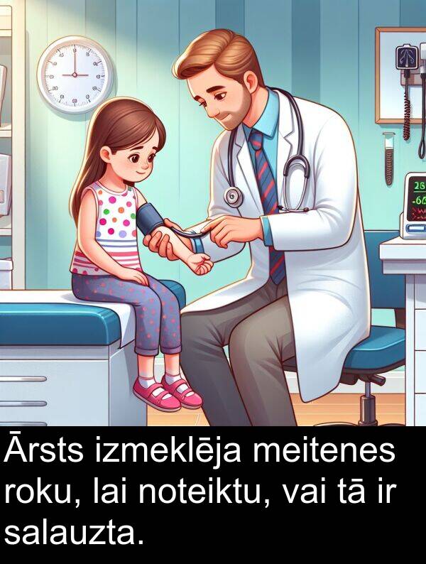 roku: Ārsts izmeklēja meitenes roku, lai noteiktu, vai tā ir salauzta.