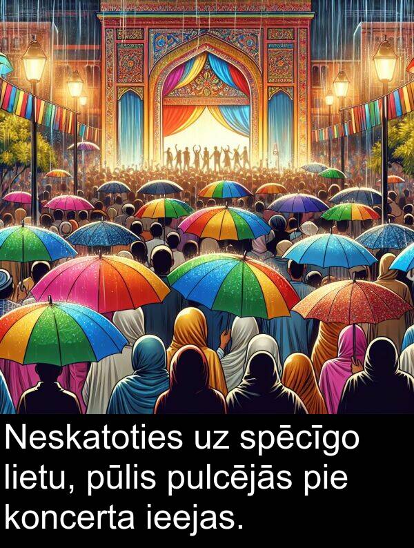 koncerta: Neskatoties uz spēcīgo lietu, pūlis pulcējās pie koncerta ieejas.