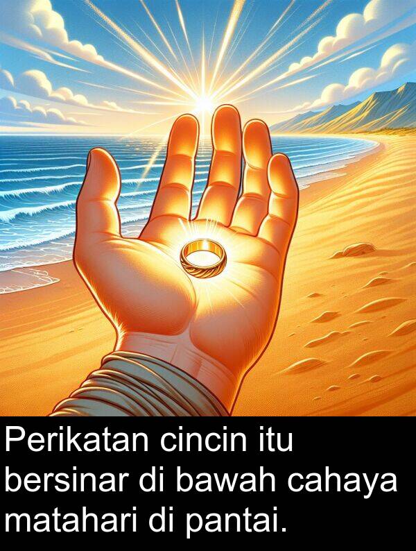 bawah: Perikatan cincin itu bersinar di bawah cahaya matahari di pantai.