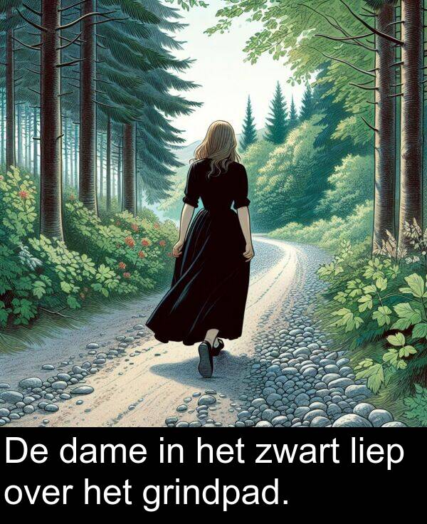 grindpad: De dame in het zwart liep over het grindpad.