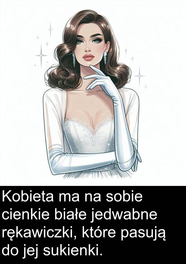 jedwabne: Kobieta ma na sobie cienkie białe jedwabne rękawiczki, które pasują do jej sukienki.
