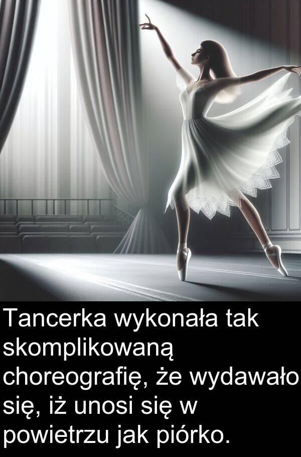 powietrzu: Tancerka wykonała tak skomplikowaną choreografię, że wydawało się, iż unosi się w powietrzu jak piórko.