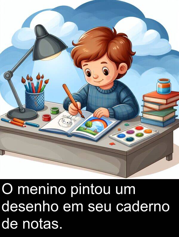 caderno: O menino pintou um desenho em seu caderno de notas.