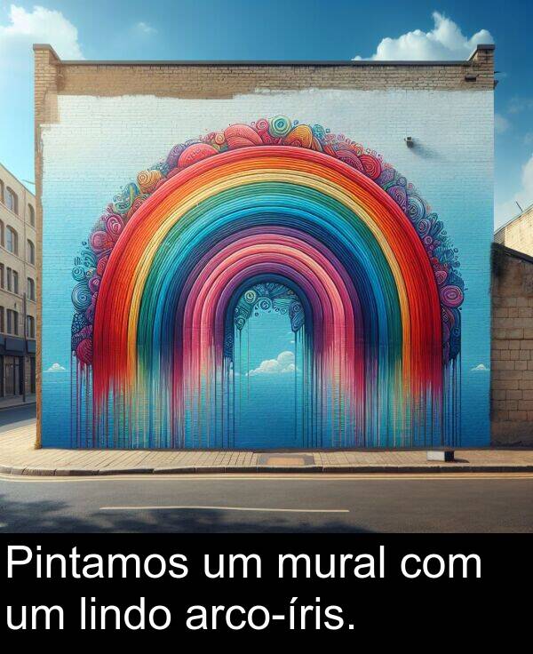 mural: Pintamos um mural com um lindo arco-íris.