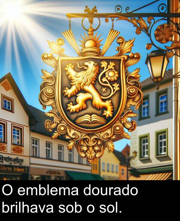 sob: O emblema dourado brilhava sob o sol.