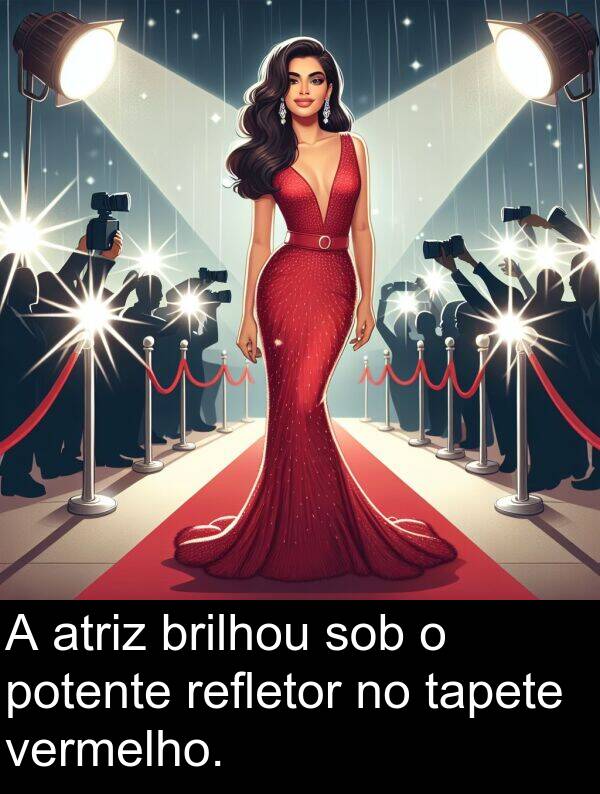 sob: A atriz brilhou sob o potente refletor no tapete vermelho.