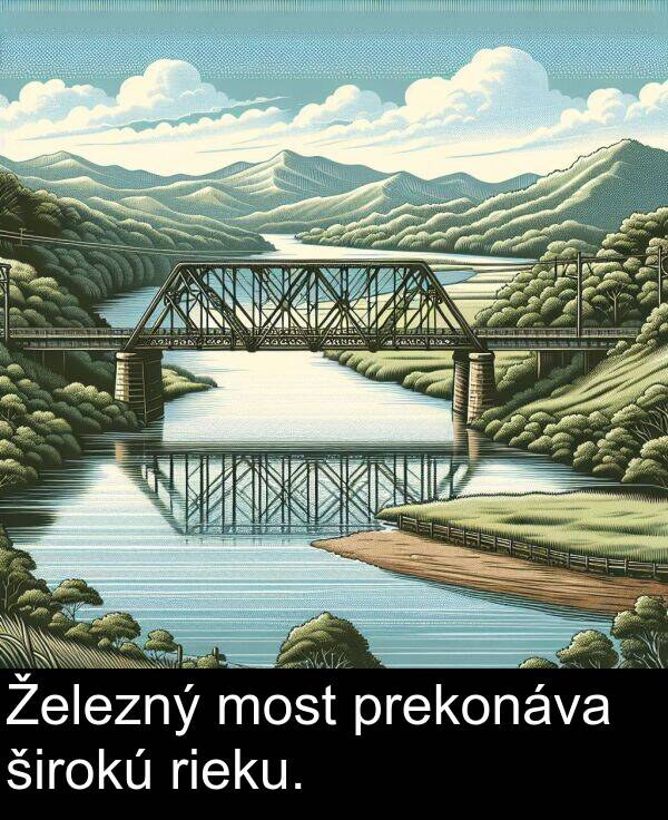 širokú: Železný most prekonáva širokú rieku.