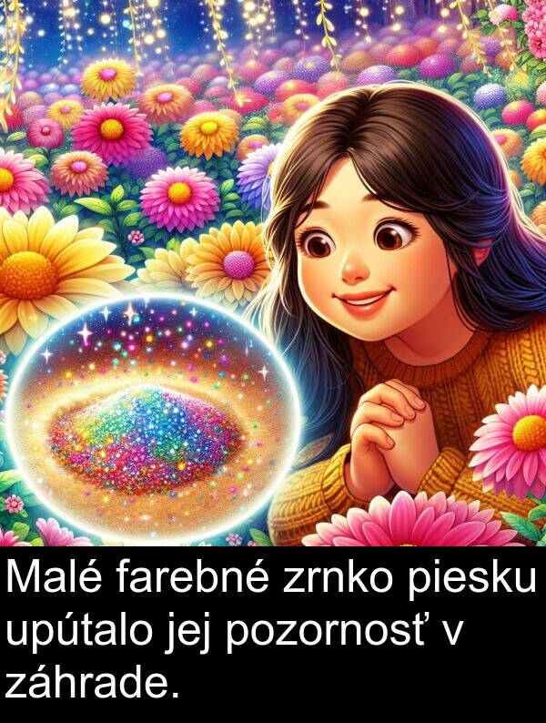 farebné: Malé farebné zrnko piesku upútalo jej pozornosť v záhrade.