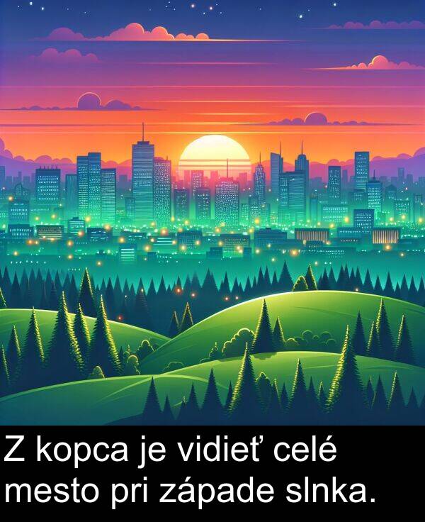 celé: Z kopca je vidieť celé mesto pri západe slnka.