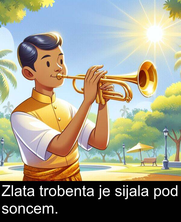 soncem: Zlata trobenta je sijala pod soncem.
