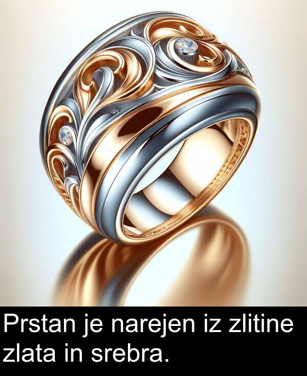 narejen: Prstan je narejen iz zlitine zlata in srebra.