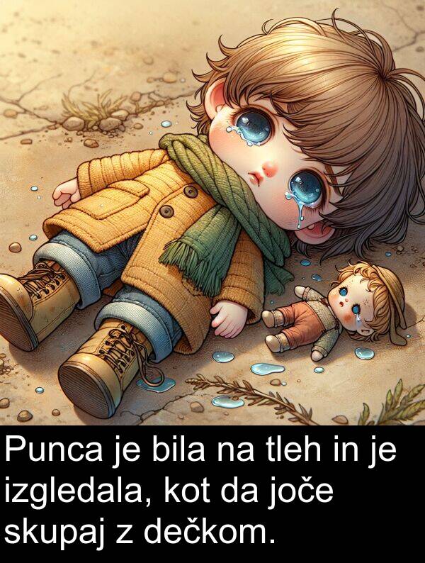 dečkom: Punca je bila na tleh in je izgledala, kot da joče skupaj z dečkom.