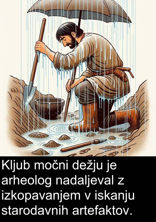 nadaljeval: Kljub močni dežju je arheolog nadaljeval z izkopavanjem v iskanju starodavnih artefaktov.