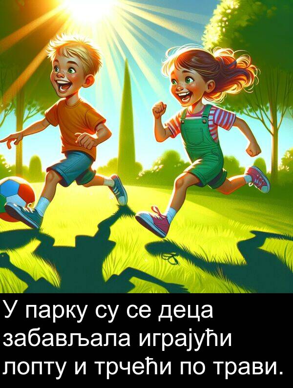 трави: У парку су се деца забављала играјући лопту и трчећи по трави.