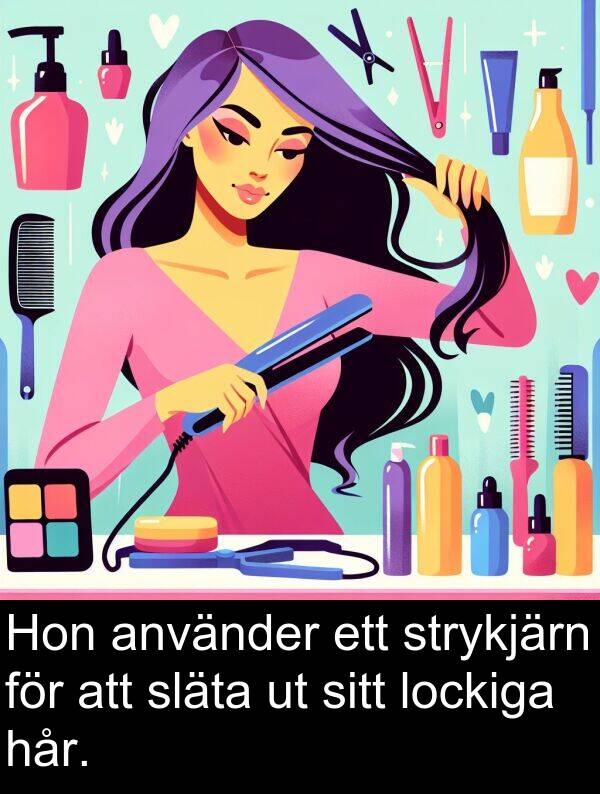 hår: Hon använder ett strykjärn för att släta ut sitt lockiga hår.