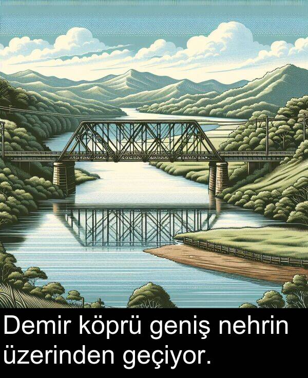geçiyor: Demir köprü geniş nehrin üzerinden geçiyor.