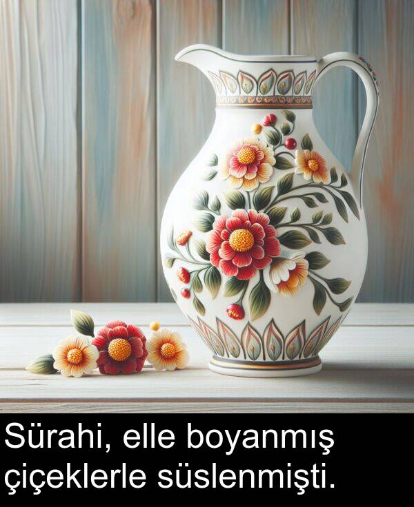 süslenmişti: Sürahi, elle boyanmış çiçeklerle süslenmişti.