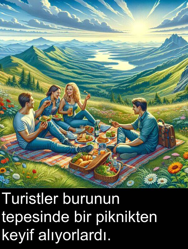 alıyorlardı: Turistler burunun tepesinde bir piknikten keyif alıyorlardı.