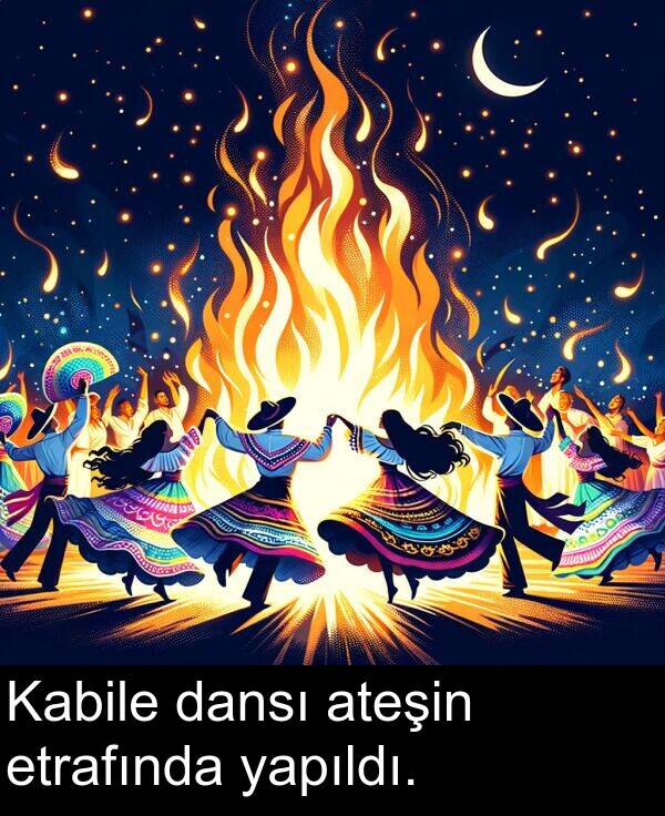 yapıldı: Kabile dansı ateşin etrafında yapıldı.