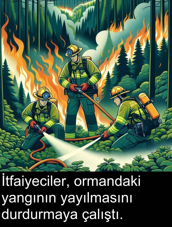 yangının: İtfaiyeciler, ormandaki yangının yayılmasını durdurmaya çalıştı.
