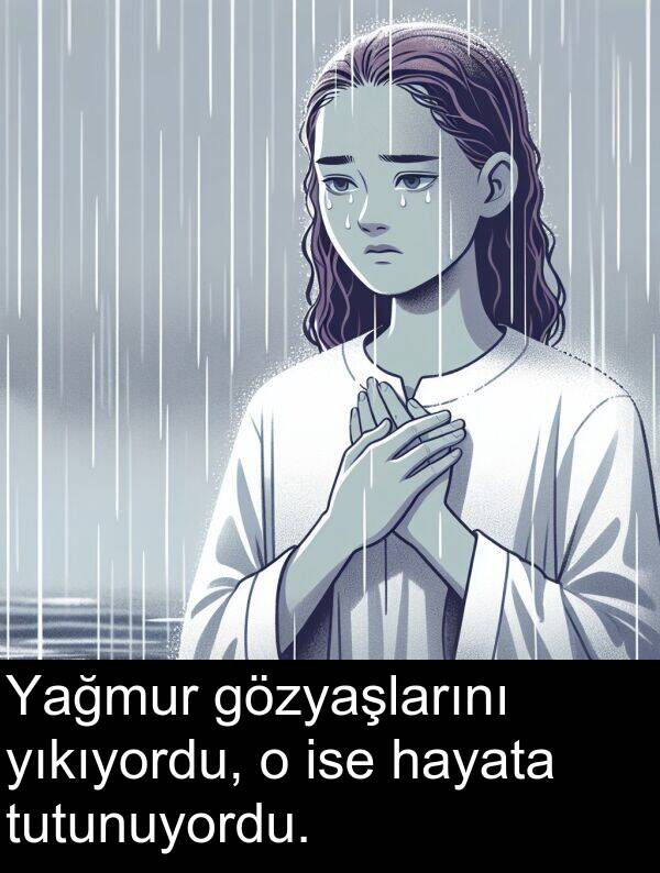 ise: Yağmur gözyaşlarını yıkıyordu, o ise hayata tutunuyordu.
