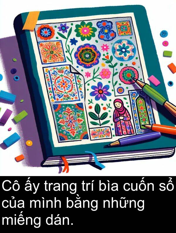 cuốn: Cô ấy trang trí bìa cuốn sổ của mình bằng những miếng dán.