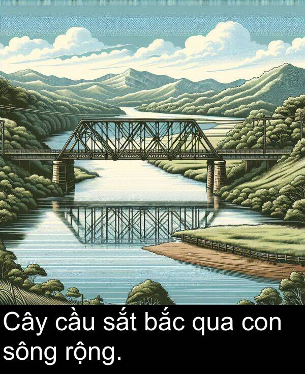 bắc: Cây cầu sắt bắc qua con sông rộng.