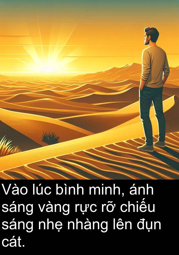 đụn: Vào lúc bình minh, ánh sáng vàng rực rỡ chiếu sáng nhẹ nhàng lên đụn cát.