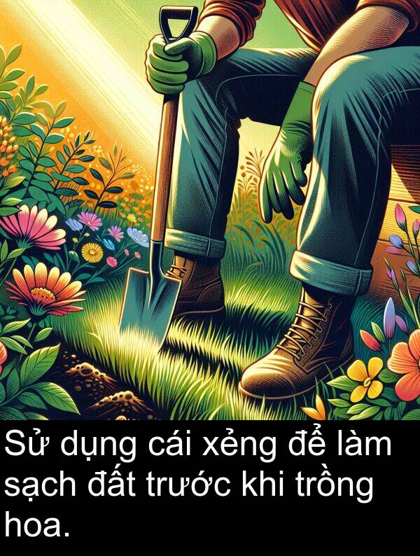 đất: Sử dụng cái xẻng để làm sạch đất trước khi trồng hoa.