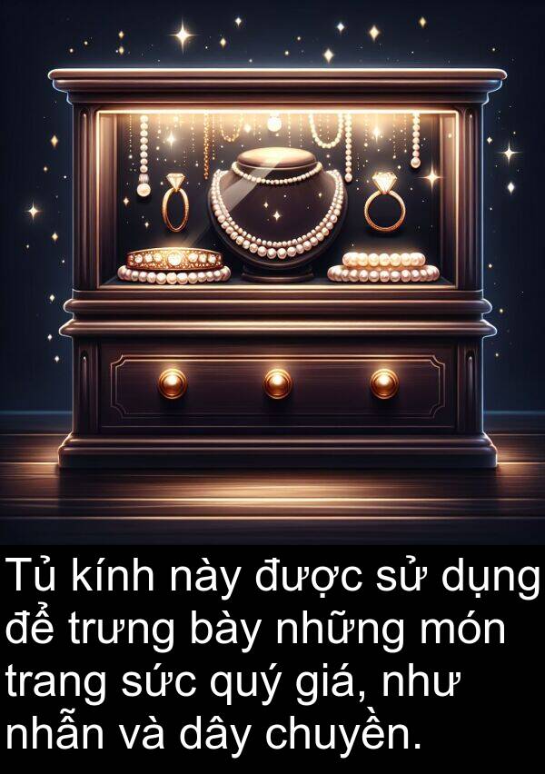bày: Tủ kính này được sử dụng để trưng bày những món trang sức quý giá, như nhẫn và dây chuyền.