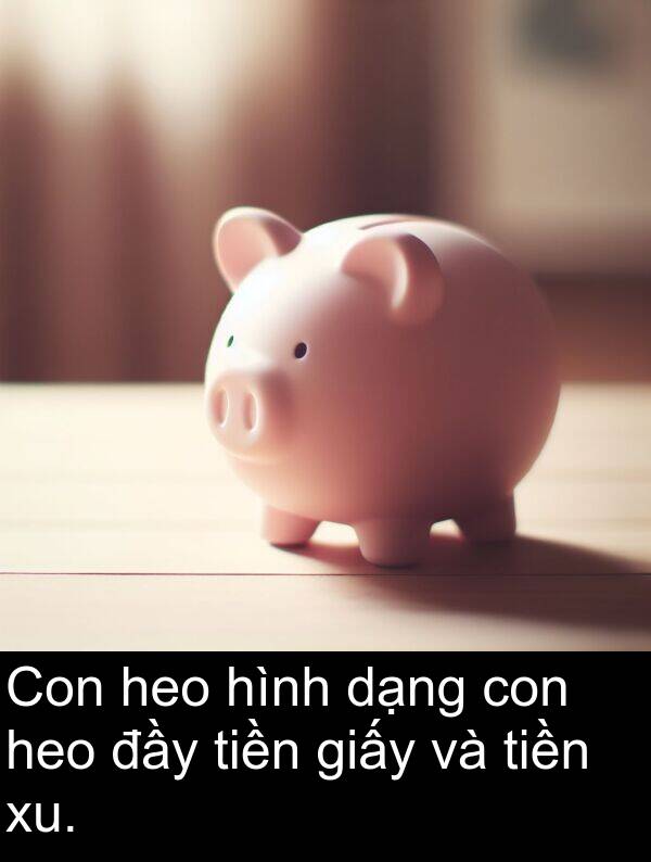 dạng: Con heo hình dạng con heo đầy tiền giấy và tiền xu.