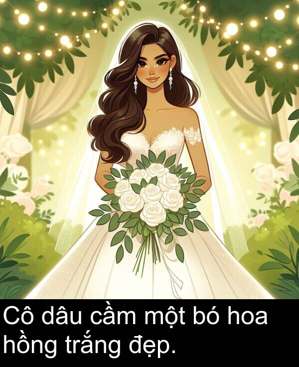 đẹp: Cô dâu cầm một bó hoa hồng trắng đẹp.