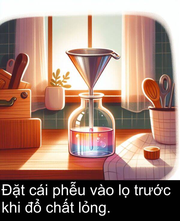 phễu: Đặt cái phễu vào lọ trước khi đổ chất lỏng.