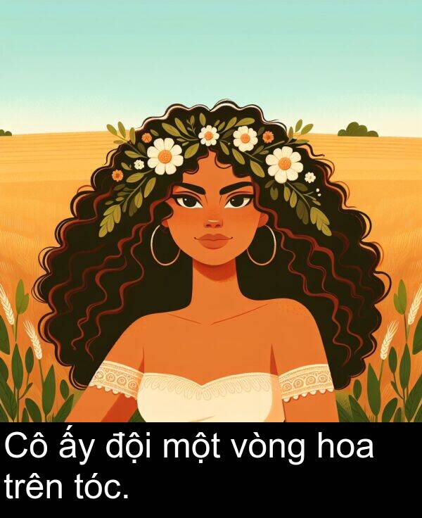trên: Cô ấy đội một vòng hoa trên tóc.