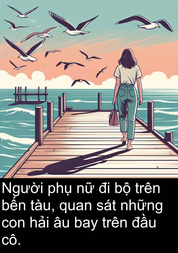 hải: Người phụ nữ đi bộ trên bến tàu, quan sát những con hải âu bay trên đầu cô.
