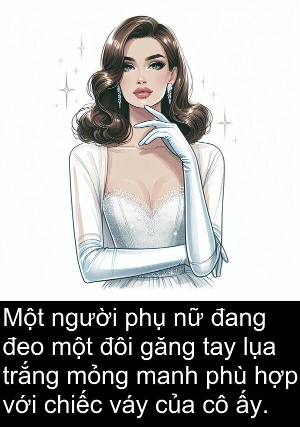 đôi: Một người phụ nữ đang đeo một đôi găng tay lụa trắng mỏng manh phù hợp với chiếc váy của cô ấy.
