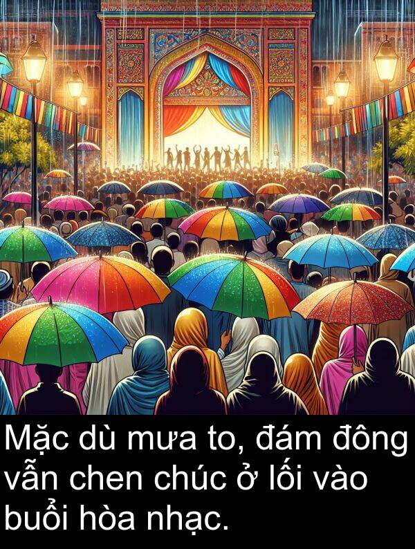 đông: Mặc dù mưa to, đám đông vẫn chen chúc ở lối vào buổi hòa nhạc.
