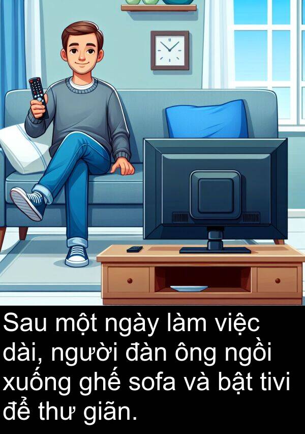 giãn: Sau một ngày làm việc dài, người đàn ông ngồi xuống ghế sofa và bật tivi để thư giãn.