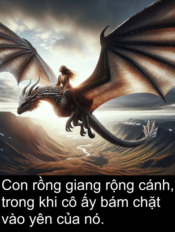 giang: Con rồng giang rộng cánh, trong khi cô ấy bám chặt vào yên của nó.