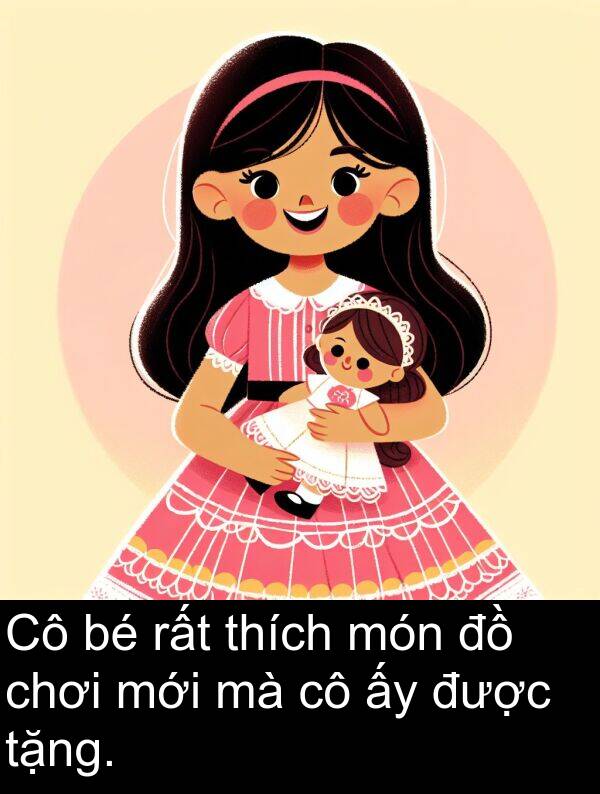 mới: Cô bé rất thích món đồ chơi mới mà cô ấy được tặng.